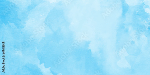 Winter morning fresh sky with bright and shiny clouds, Sky clouds with brush painted blue watercolor texture, small and large clouds alternating and moving slowly on cloudy winter morning sky.