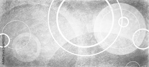 Abstract geometric background of white circles on textured gray black background in random abstract pattern, abstract modern art design with distressed grunge texture