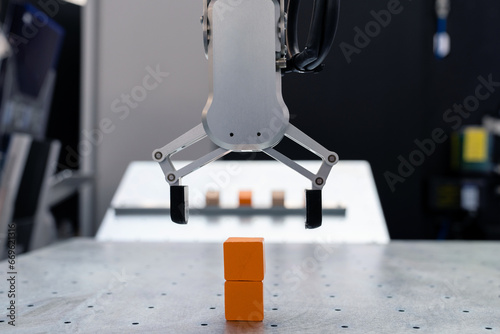 Modern handling robot - robotic arm. Smart factory