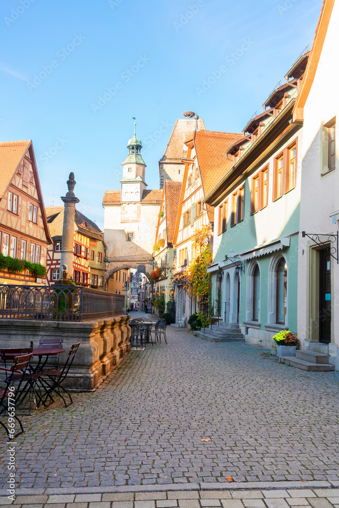 Marcus Tower with fountain and Roderbogen arch, street in Rothenburg ob der Tauber, Germany
