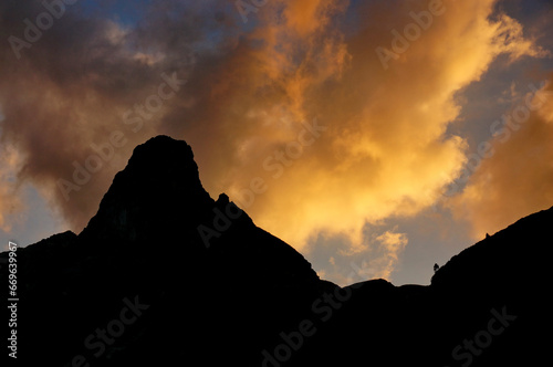 Silhouette of a mountain peak Jastrabia veza in High Tatras with dramatic sunset clouds - Slovakia, Europe - Image