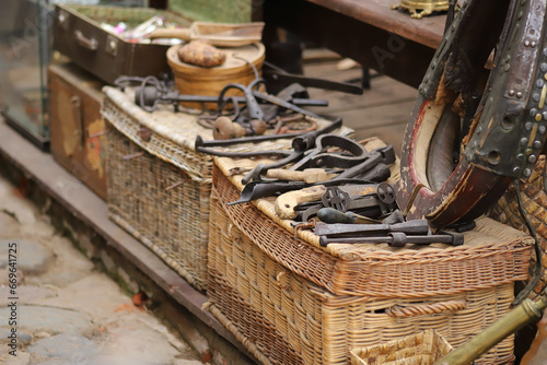 Canvastavla Various antiques, old vintage tools and objects for sale at a flea market