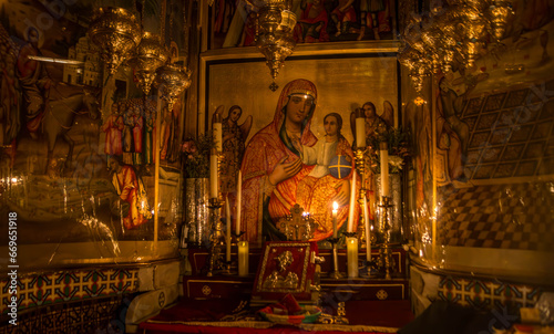 Fotografie The icon of Jesus Christ and Virgin Mary at the Church of the Holy Sepulchre, Christian shrine, at Jerusalem, Israel