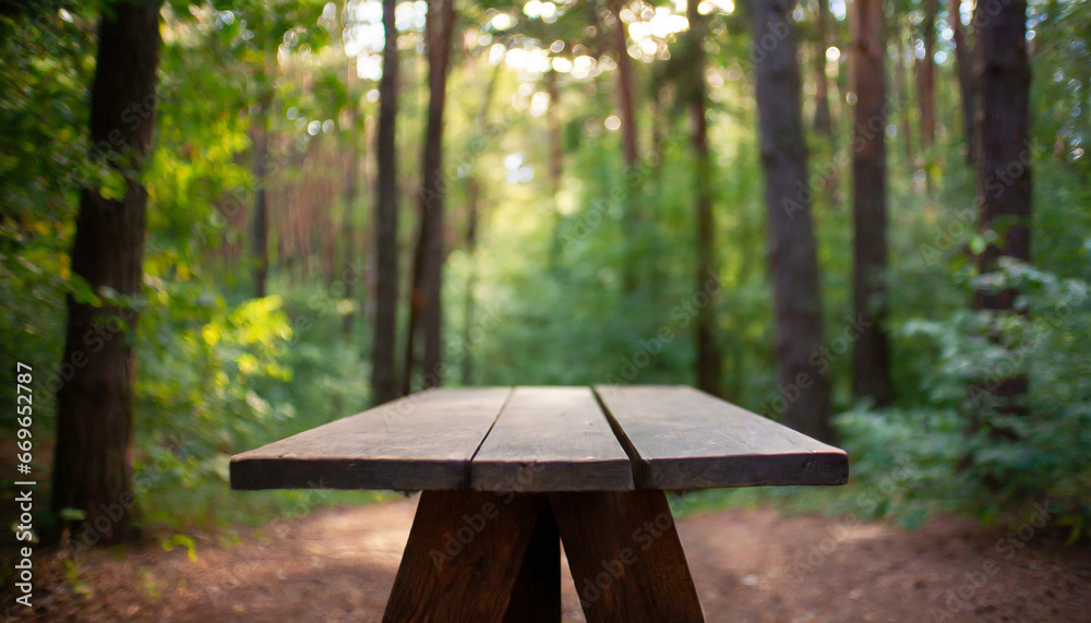 in a green forest a wooden table stands surrounded by tall trees blurred background high quality photo