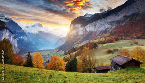 impressive outdoor scene of swiss alps bernese oberland in the canton of bern switzerland europe magnificent autumn sunrise in lauterbrunnen village beauty of countryside concept background photo