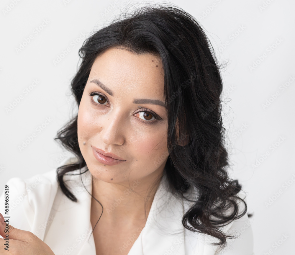 Closeup pure portrait young attractive indian woman. Perfect skin cosmetology and make-up concept Closeup pure portrait young attractive indian woman. Perfect skin cosmetology and make-up concept