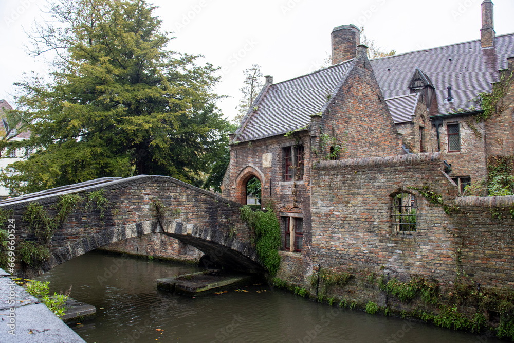 Picturesque view of Boniface Bridge (Bonifaciusbrug) and the charming canal in Bruges, a tranquil scene in the heart of the city