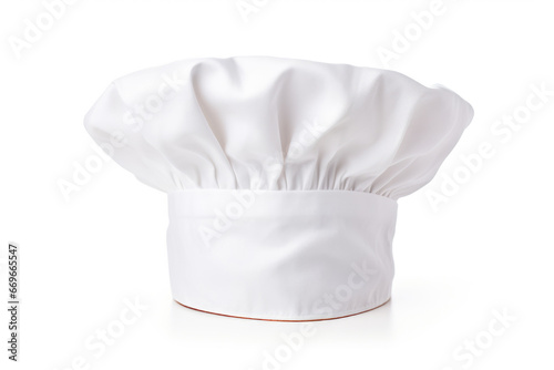 An isolated white chef's cap stands as a quintessential part of the professional culinary uniform