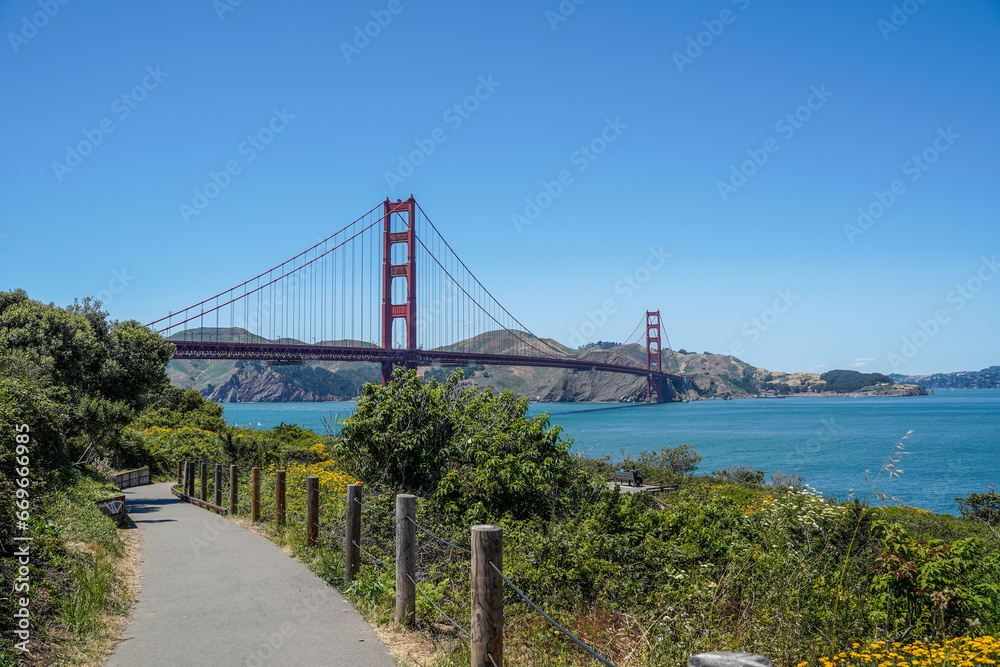 Golden Gate Bridge in San Francisco, California. Walkway leading to the bridge. Golden Gate Bridge in San Francisco, California. Walkway leading to the bridge.