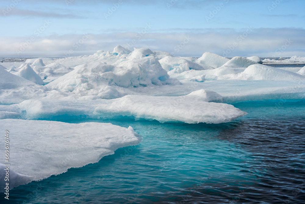 Melting ice at the edge of the ice pack in the arctic ocean, ice bergs floating in the ocean in the far north, signs of global warming and climate change
Melting ice at the edge of the ice pack in the arctic ocean, ice bergs floating in the ocean in the far north, signs of global warming and climate change
