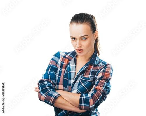 Confident Woman Striking a Pose With Crossed Arms. A woman with her arms crossed standing in front of a camera © Vadim