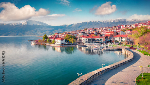 impressive spring cityscape of pogradec town beautiful outdoor scene of ohrid lake superb morning view of albania europe traveling concept background photo