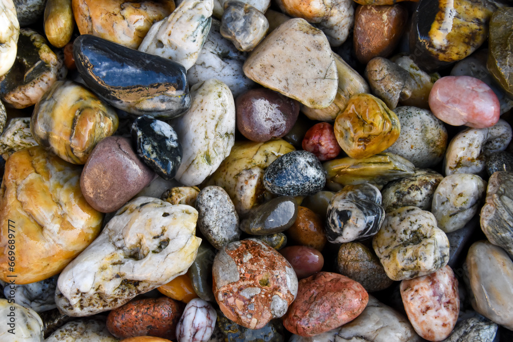 Colorful pebble rocks on the ground Colorful pebble rocks on the ground