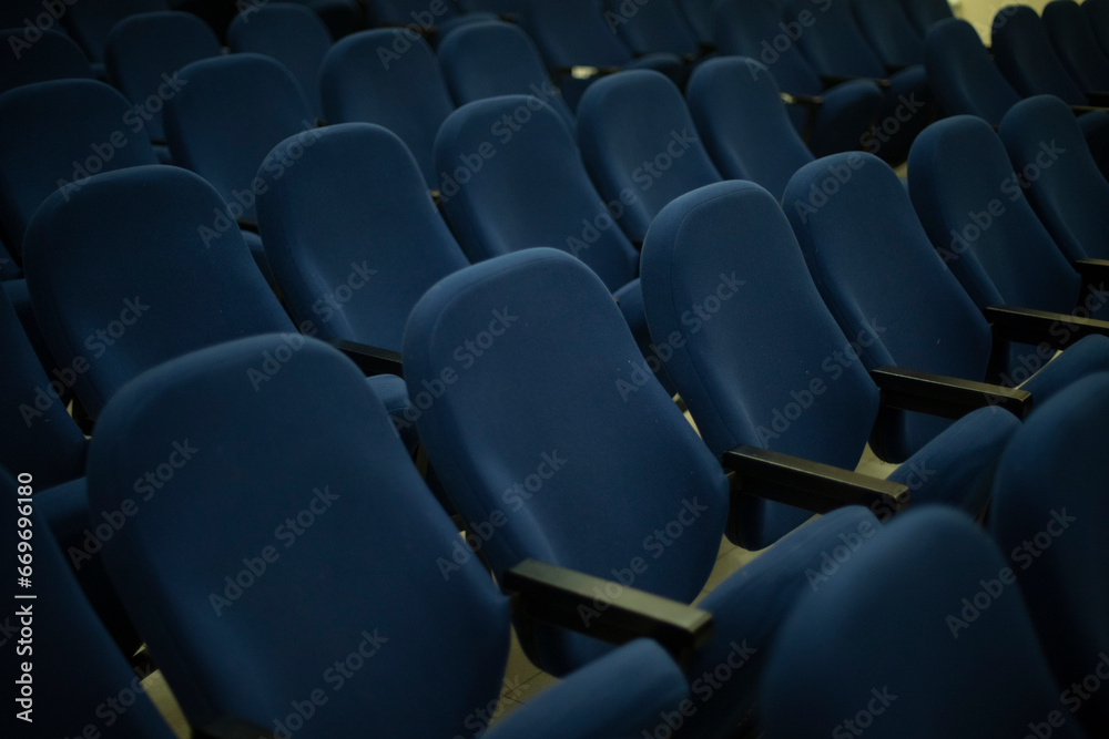 Obraz premium Blue seats in hall. Rows of seats. Cinema Details.