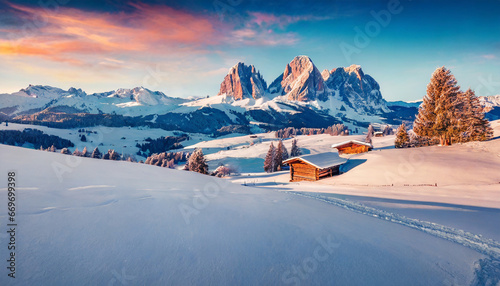 Untouched winter landscape. Calm sunrise in Alpe di Siusi village. Snowy outdoor scene of Dolomite Alps, Ityaly, Europe. Beauty of nature concept background photo