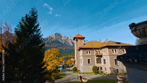 Lovely scenery of the old-fashioned house located in the picturesque landscape. Amazing autumn sunny day in mountains. photo