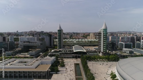Aerial view of Altice Arena, Sao Gabriel and Sao Rafael Towers in the Park of Nations. Lisbon, Portugal 4k photo