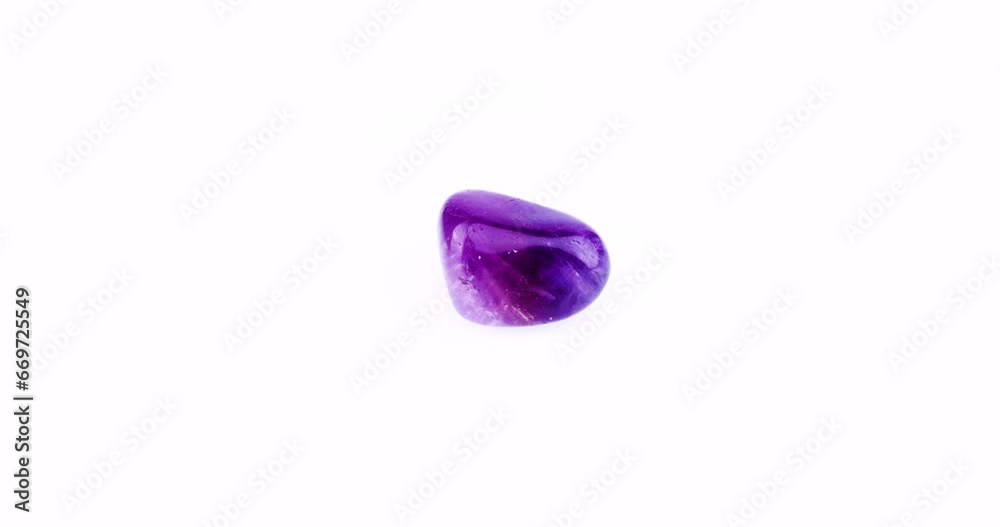 Polished amethyst 360° rotation in 4k macro isolated on white background. macro detail close-up polished semi-precious gemstone copy space
Polished amethyst 360° rotation in 4k macro isolated on white background. macro detail close-up polished semi-precious gemstone copy space