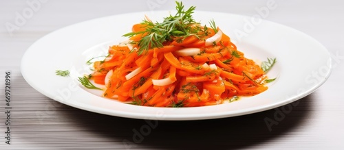 Vegetable salad on white plate on table