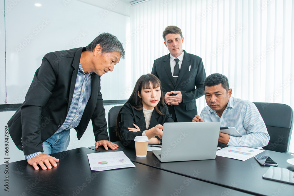 Business people team work while working in board room, design project, discussing ideas,discuss financial statistics together teamwork concept Business people team work while working in board room, design project, discussing ideas,discuss financial statistics together teamwork concept