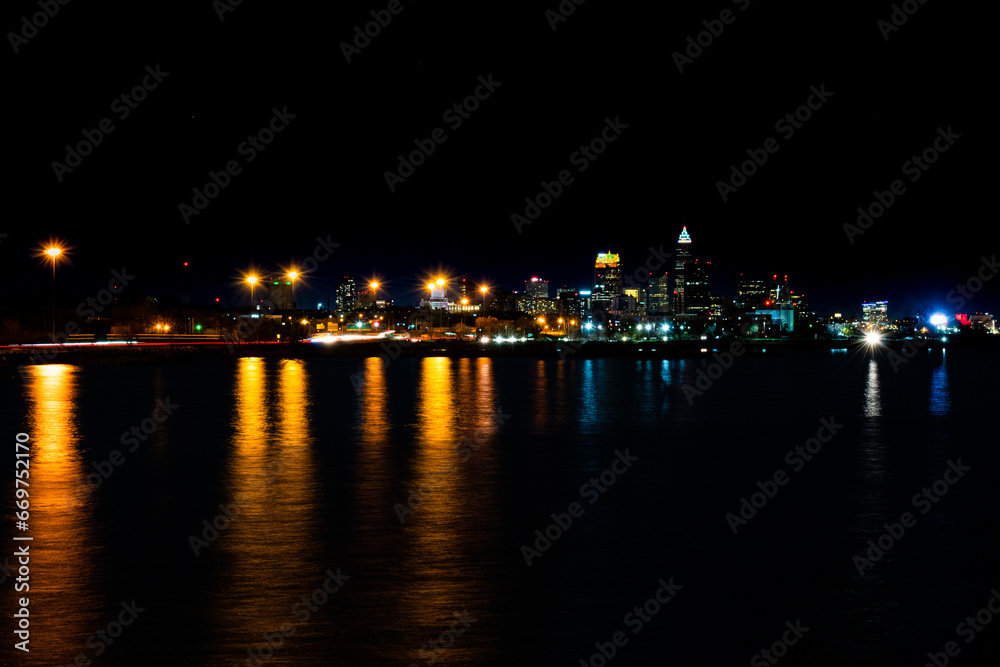Streetlamps Reflecting in Lake Erie with Cleveland in the Distance