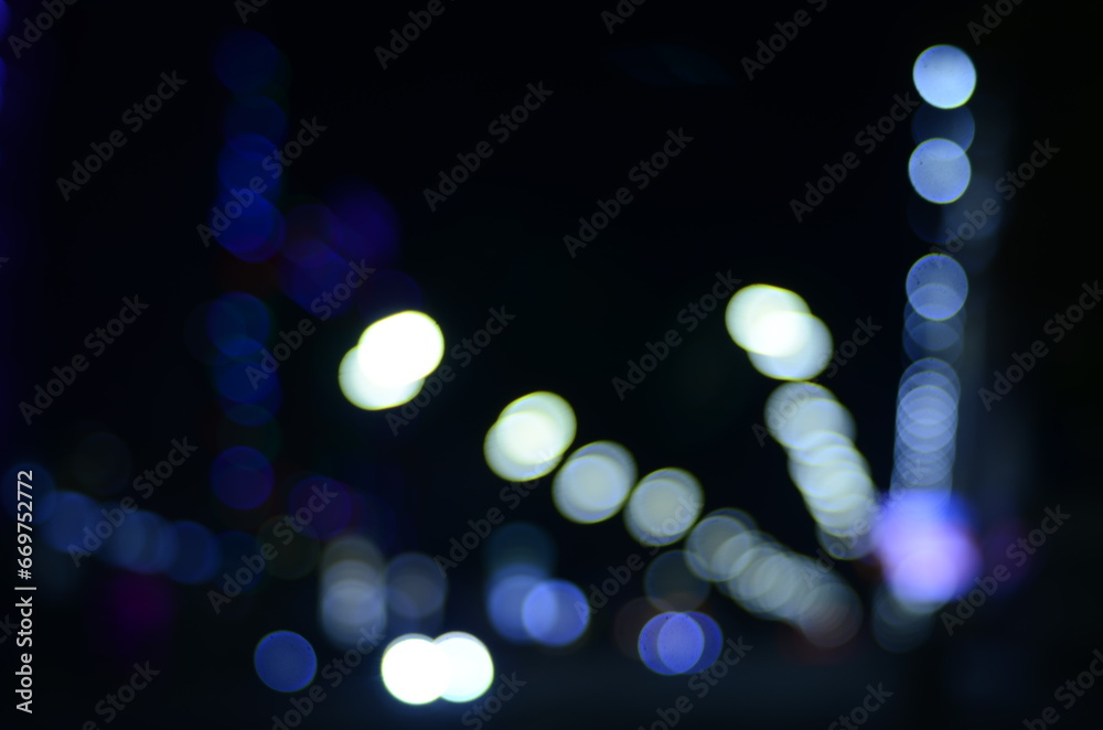 Fototapeta premium Blurred view of night city street 