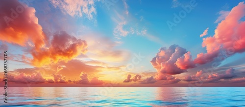 Colorful sunset sky over Mediterranean Sea clouds with sunrays cloudscape nature background panorama photo
