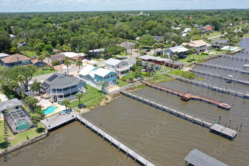 Aerial of Halifax River (Intracoastal Waterway ) front homes with boat docks, Daytona Beach, Florida, USA.	