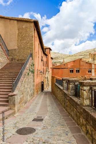 Old street in the center of historic town Albarracin, Spain