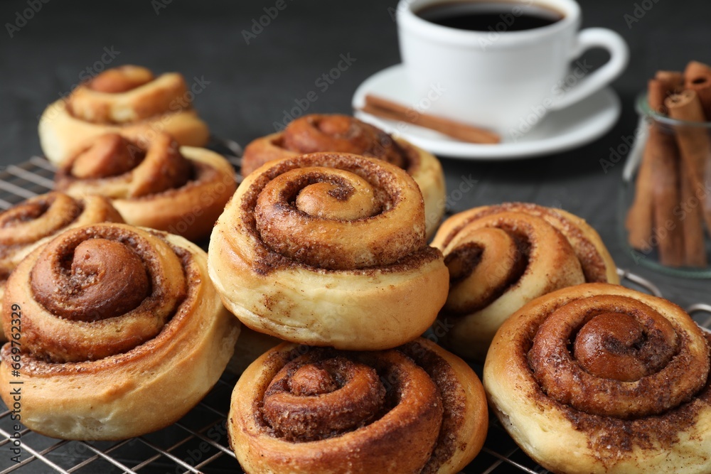 Tasty cinnamon rolls on table, closeup view Tasty cinnamon rolls on table, closeup view
