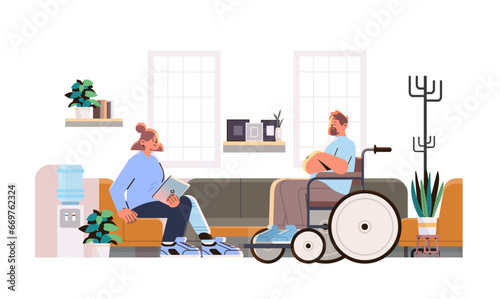 disabled man in wheelchair during therapy with counselor psychotherapist mental health support people with disabilities