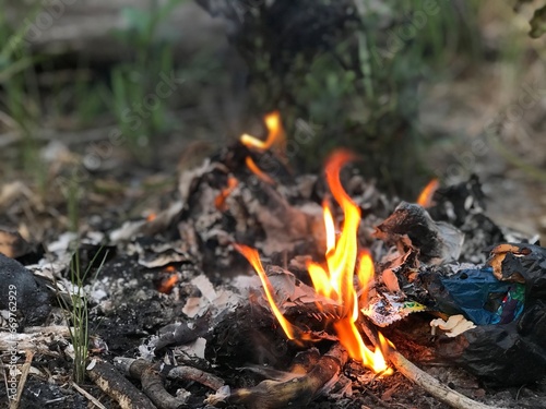 rubbish burn on the ground. waste burning