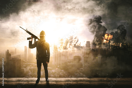 rebel militant terrorist guerrilla with burning city in the background photo