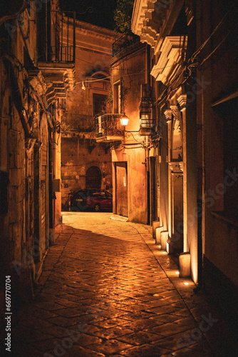 The narrow streets of the baroque style city of Modica  Sicily  Italy