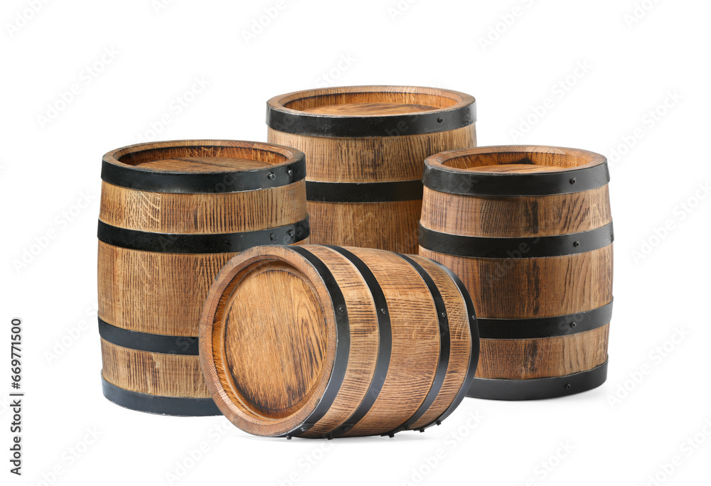 Set of many wooden barrels on white background Set of many wooden barrels on white background