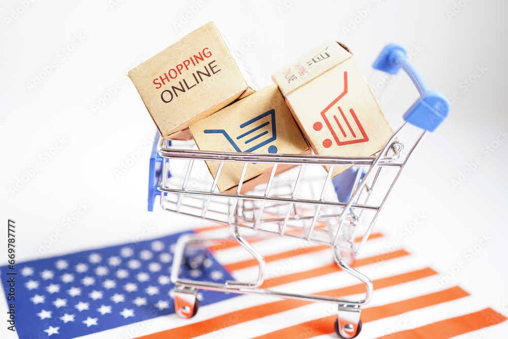 Online shopping, Shopping cart box on USA America flag, import export, finance commerce.