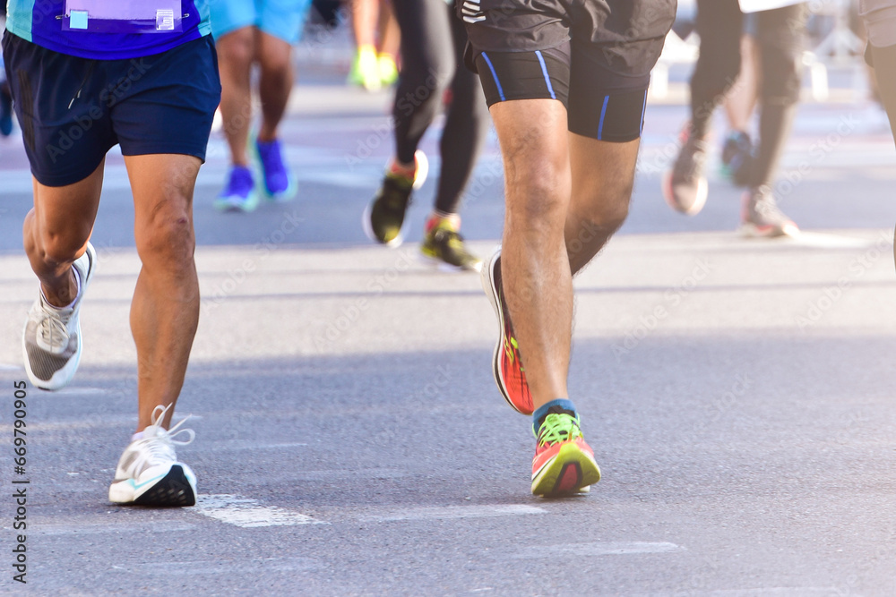 Marathon Running In The Light Of Morning, People Running On City Road Detail On Legs, Step, Walk And Outdoor Exercise Activities Concept.