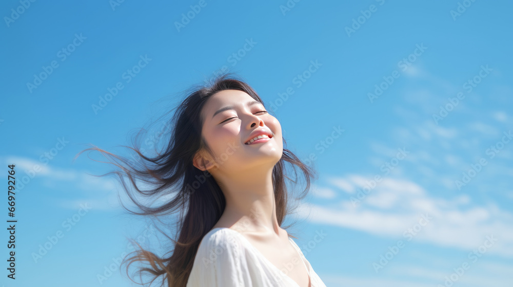 Young Japanese woman with radiant smile practicing yoga outdoors Young Japanese woman with radiant smile practicing yoga outdoors
