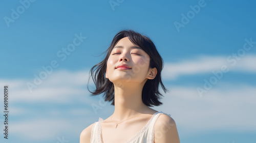 Young Japanese woman with radiant smile practicing yoga outdoors generative ai © Suralai