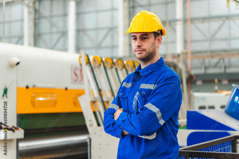 Professional male caucasian engineer or manufacturing worker man person in factory portrait, smart industry business manager occupation job with safety helmet for construction work, machinery foreman Professional male caucasian engineer or manufacturing worker man person in factory portrait, smart industry business manager occupation job with safety helmet for construction work, machinery foreman