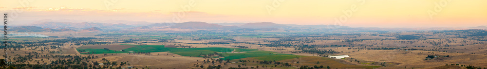 Panorama of country Australia in rural New South Wales with farmland and mountains