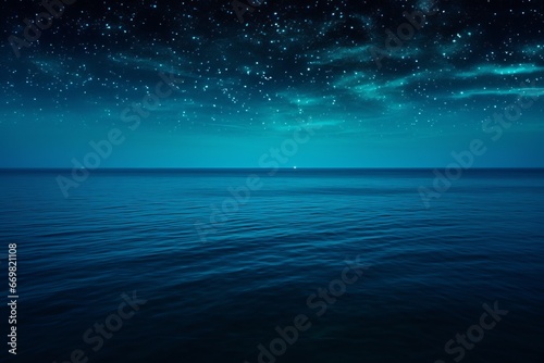 Breathtaking aerial view of a calm sea under a starry night, exuding peace and wonder. © Kishore Newton