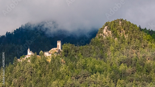 Alpine summer view with an ancient fortress near Uttenheim, Ahrntal valley, Pustertal, Trentino, Bozen, South Tyrol, Italy