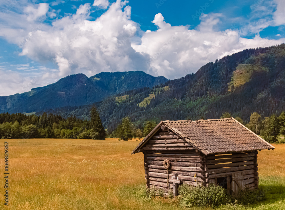 Alpine summer view with a wooden hut near Lahntal, Maishofen, Zell am See, Salzburg, Pinzgau, Tyrol, Austria