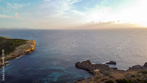 aerial drone view of the mediterranean coast at sunrise