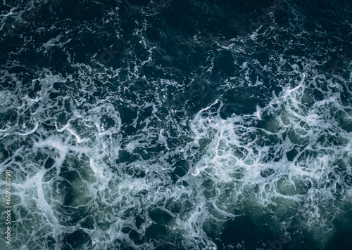 Fototapeta Naklejka Na Ścianę i Meble -  Sea waves background. Water surface texture. Top view of sea wave.