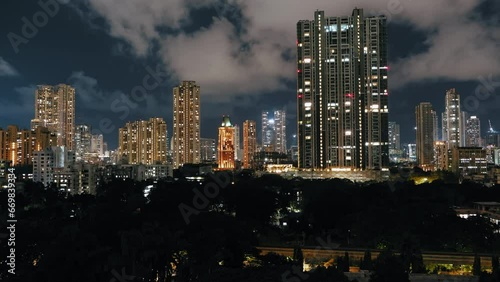 Cinematic aerial view of Mumbai's downtown night scene. Central Mumbai's cityscape and skyline- Lalbaug-Parel, Worli, Prabhadevi. beautiful modern buildings, bright glowing lights, and roads. photo