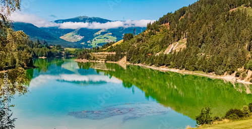 Alpine summer view at Lake Olanger See, Lago di Valdaora, Pustertal valley, Trentino, Bozen, South Tyrol photo