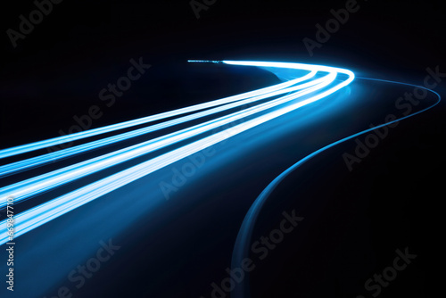 Blue lines of car speed lights on black background. High quality photo photo