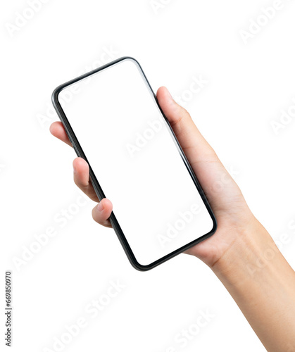 Hand holding the black smartphone with blank screen on background.
